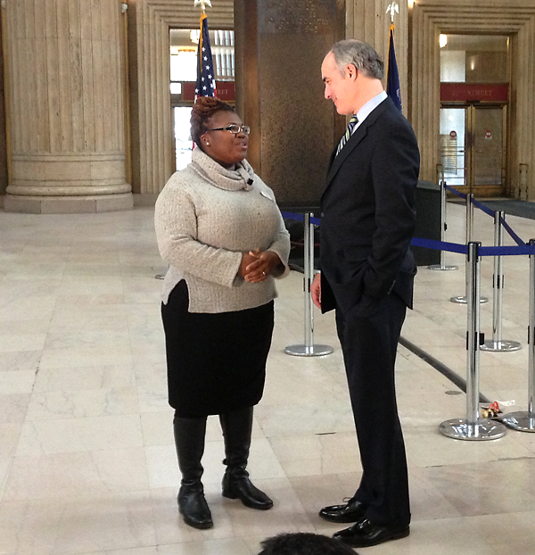 Tianna Gaines-Turner, a participant in Drexel's Witnesses to Hunger program, speaks with Senator Bob Casey, who invited her to attend the State of the Union address.